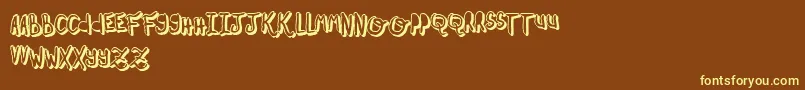OhMyOhLaLaYeah2-fontti – keltaiset fontit ruskealla taustalla