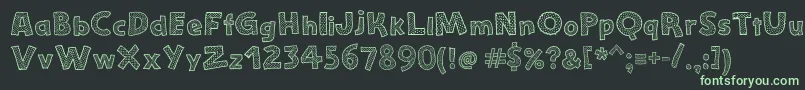 フォントStefanieDots – 黒い背景に緑の文字