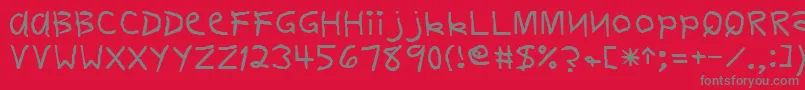 DelvinRegular-fontti – harmaat kirjasimet punaisella taustalla
