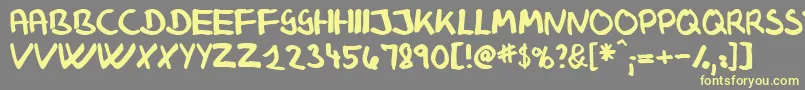 KlausJohansensHaandskrift Font – Yellow Fonts on Gray Background