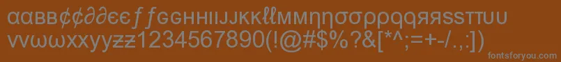 MsnWeirdFont Font – Gray Fonts on Brown Background
