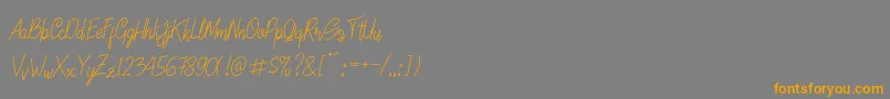LinoleoScript Font – Orange Fonts on Gray Background