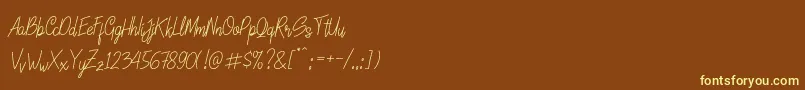 LinoleoScript-fontti – keltaiset fontit ruskealla taustalla