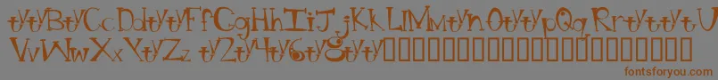 BtBongBlastedAliensTrialTrialVersion Font – Brown Fonts on Gray Background