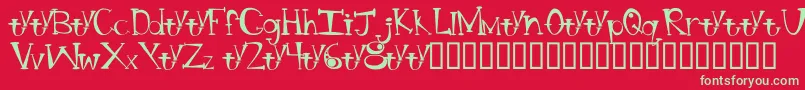 フォントBtBongBlastedAliensTrialTrialVersion – 赤い背景に緑の文字