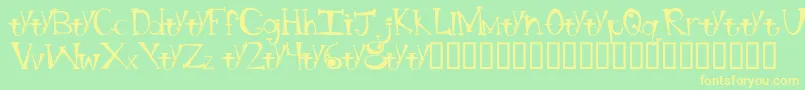 フォントBtBongBlastedAliensTrialTrialVersion – 黄色の文字が緑の背景にあります