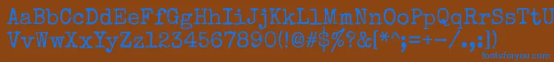 Specialelite Font – Blue Fonts on Brown Background