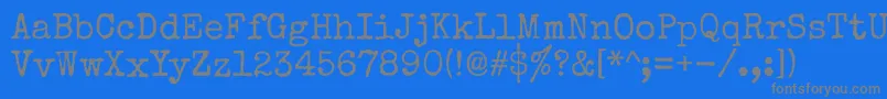 Specialelite Font – Gray Fonts on Blue Background