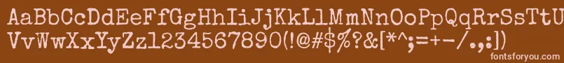 Specialelite Font – Pink Fonts on Brown Background