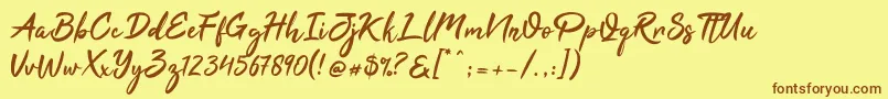 フォントTahu – 茶色の文字が黄色の背景にあります。