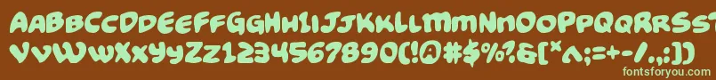フォントFunnypages – 緑色の文字が茶色の背景にあります。
