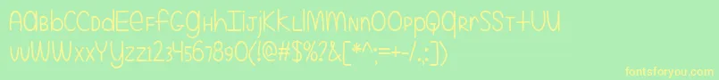 Шрифт EvenMoreMixedUp – жёлтые шрифты на зелёном фоне