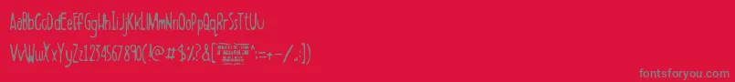 BoldensteinThin-Schriftart – Graue Schriften auf rotem Hintergrund