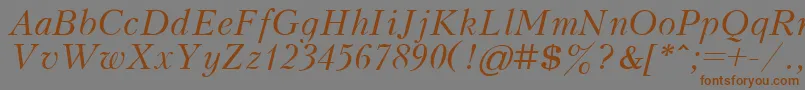 Weitere Informationen zur KudrashovItalic.001.001-Schriftart KudrashovItalic.001.001-Schriftart – Braune Schriften auf grauem Hintergrund