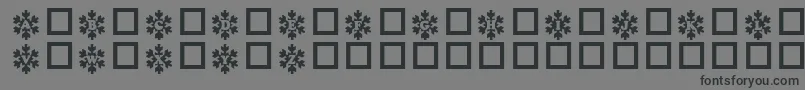 Snowyフォントについての詳細 フォントSnowy – 黒い文字の灰色の背景