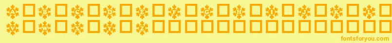 フォントSnowy – オレンジの文字が黄色の背景にあります。
