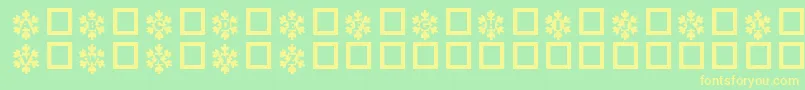 Więcej informacji o czcionce Snowy Czcionka Snowy – żółte czcionki na zielonym tle
