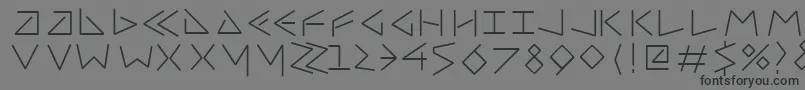 Шрифт Uncialfifty – чёрные шрифты на сером фоне