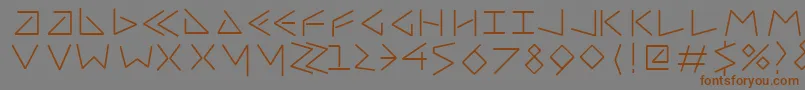 Шрифт Uncialfifty – коричневые шрифты на сером фоне