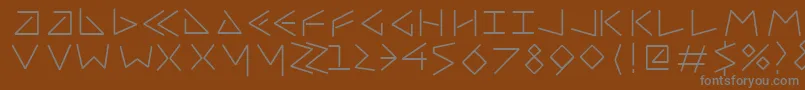 Шрифт Uncialfifty – серые шрифты на коричневом фоне