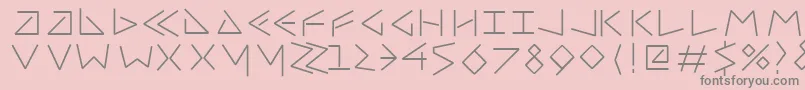 Uncialfifty-fontti – harmaat kirjasimet vaaleanpunaisella taustalla
