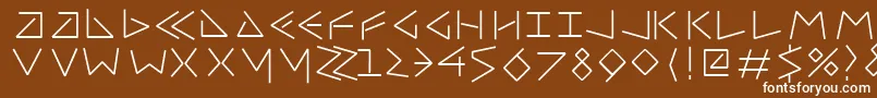Uncialfifty-fontti – valkoiset fontit ruskealla taustalla