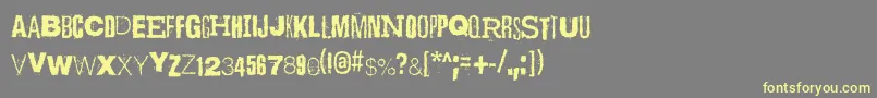 Шрифт ScizzorwreckHalbfettAlt – жёлтые шрифты на сером фоне