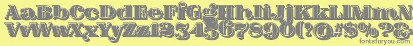 FatFlamingo5SideFill Font – Gray Fonts on Yellow Background