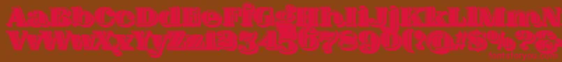 フォントFatFlamingo5SideFill – 赤い文字が茶色の背景にあります。