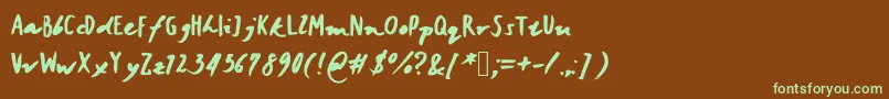 フォントJanicehandbold – 緑色の文字が茶色の背景にあります。