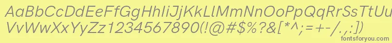 フォントHkgroteskItalic – 黄色の背景に灰色の文字