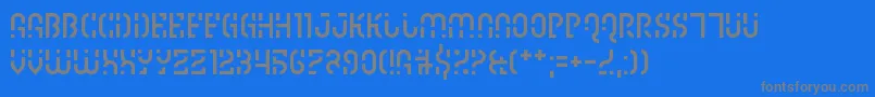 フォントIpscrik – 青い背景に灰色の文字