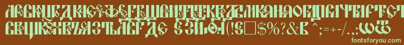 フォントLavraPlain – 緑色の文字が茶色の背景にあります。