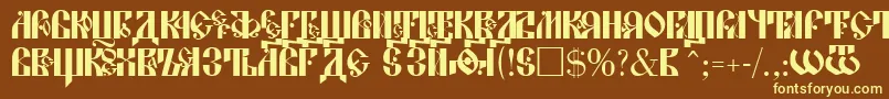 LavraPlain-fontti – keltaiset fontit ruskealla taustalla