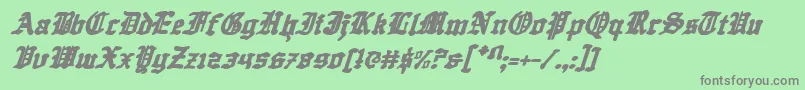 フォントQuestknighti – 緑の背景に灰色の文字