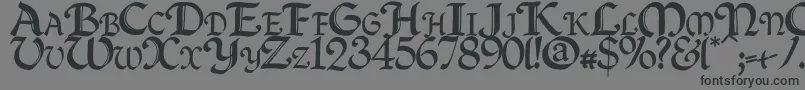 Czcionka Quillcapitals – czarne czcionki na szarym tle