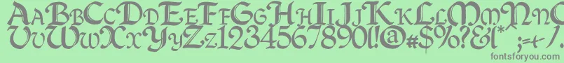Quillcapitals Font – Gray Fonts on Green Background