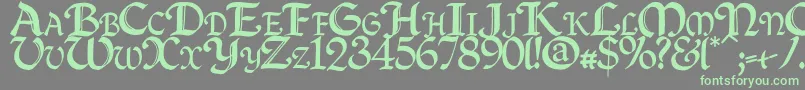 フォントQuillcapitals – 灰色の背景に緑のフォント