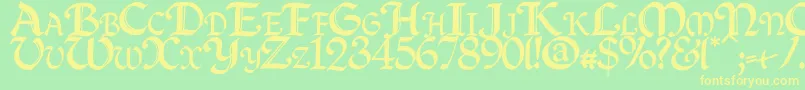 Quillcapitals Font – Yellow Fonts on Green Background