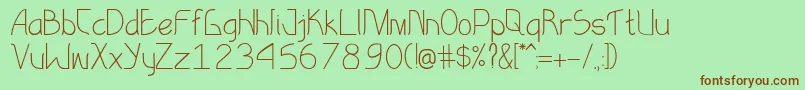 EksotikaRegular Font – Brown Fonts on Green Background