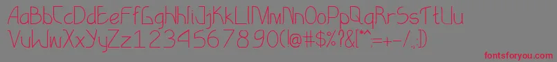 EksotikaRegular Font – Red Fonts on Gray Background