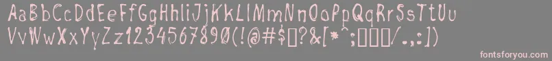 フォントNegada – 灰色の背景にピンクのフォント