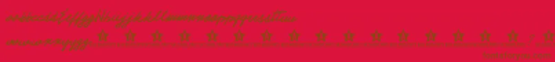 フォントElectTrial – 赤い背景に茶色の文字