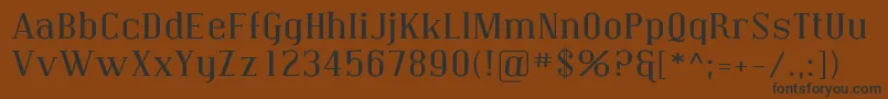 フォントCovingtonExp – 黒い文字が茶色の背景にあります