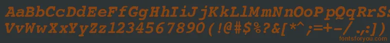 Czcionka CourierBoldItalic – brązowe czcionki na czarnym tle