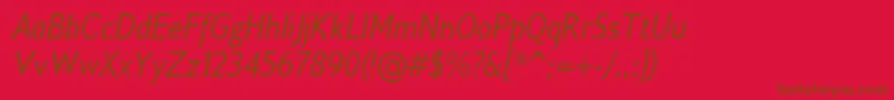 フォントGilliusadfno2Conditalic – 赤い背景に茶色の文字