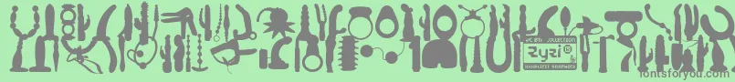 WcZyziBta Font – Gray Fonts on Green Background