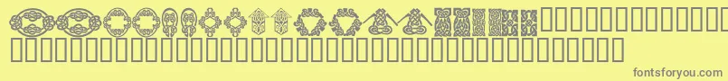 KrKelticFive-Schriftart – Graue Schriften auf gelbem Hintergrund