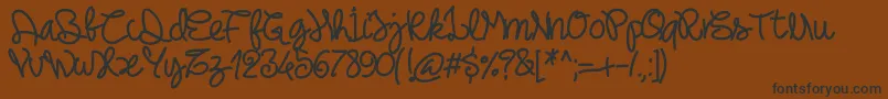 Pwnoodlething-Schriftart – Schwarze Schriften auf braunem Hintergrund