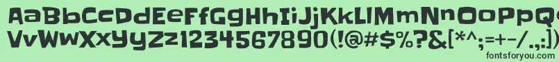 Шрифт Slackey – чёрные шрифты на зелёном фоне